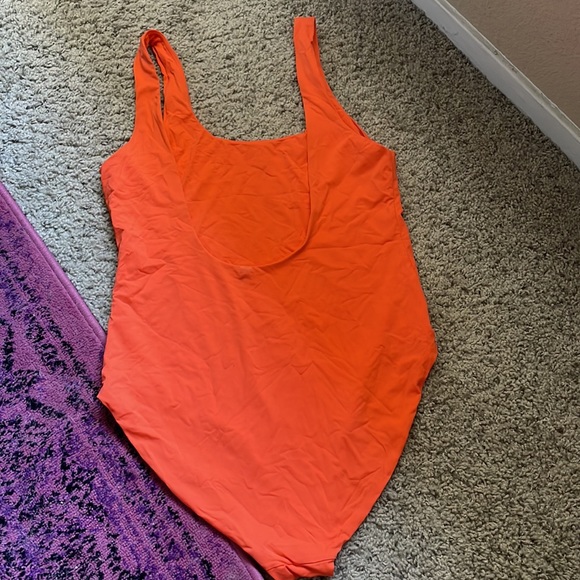 Light Orange Swimsuit by Girlfriend Collective - Picture 2 of 6
